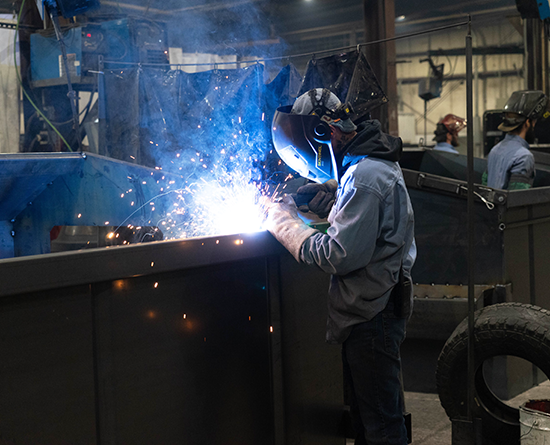 Man welding in welding gear