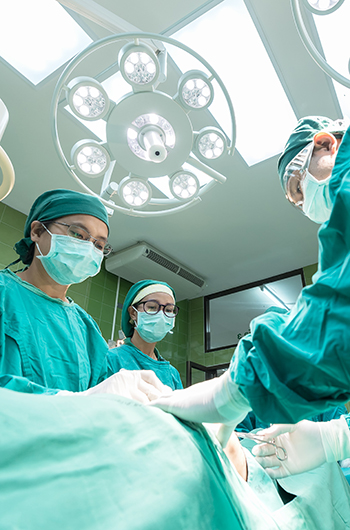 Additive manufacturing of functionally graded medical devices