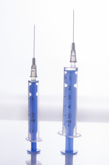 Additive manufacturing method for smart surgical needles